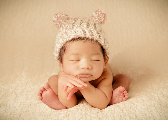 head in hands pose teddy bear hat boy pictures